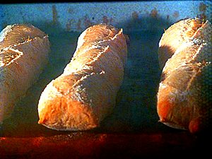 French bread loaves baking at Paul in Somerville