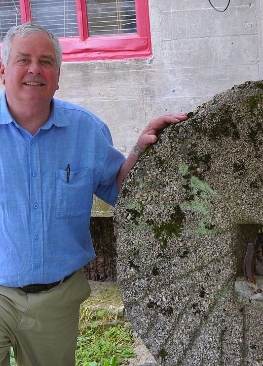 Mac Weisenberger with millstone