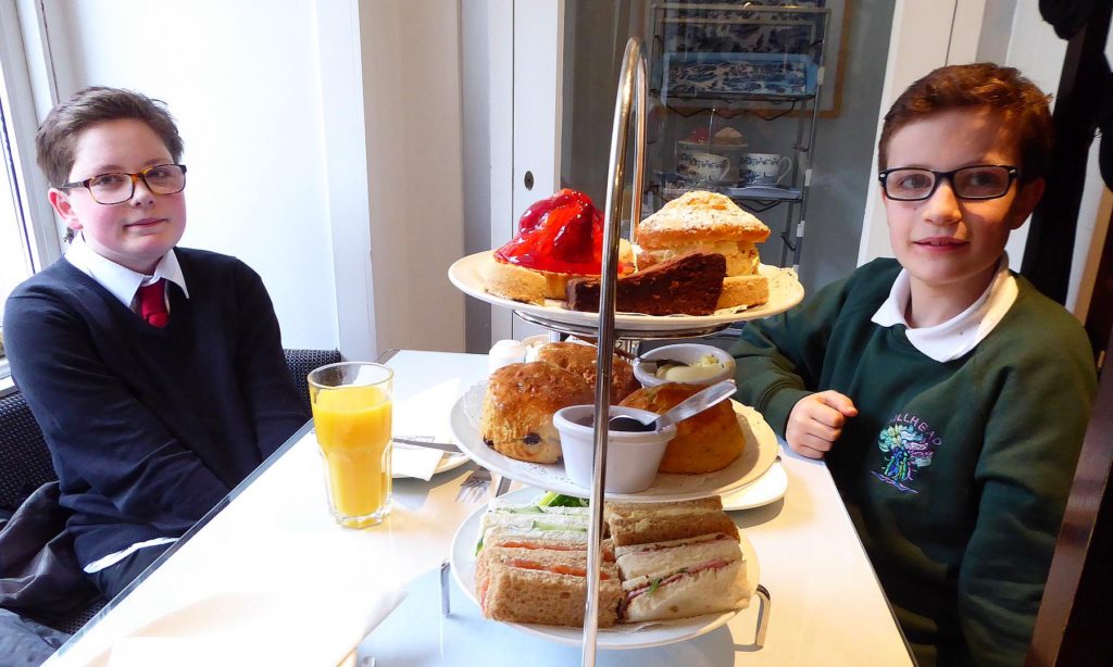 Boys at Willow Tea Rooms on Buchanan Street in Glasgow